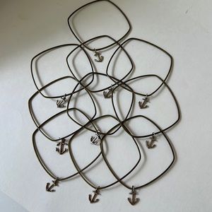Brass bangles with sterling silver anchors
